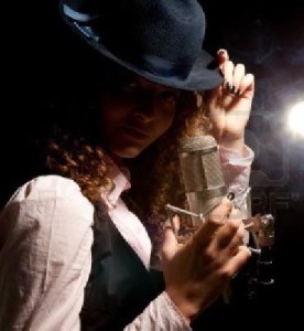 9191024-beautiful-singer-in-hat-with-microphone-on-the-black-background